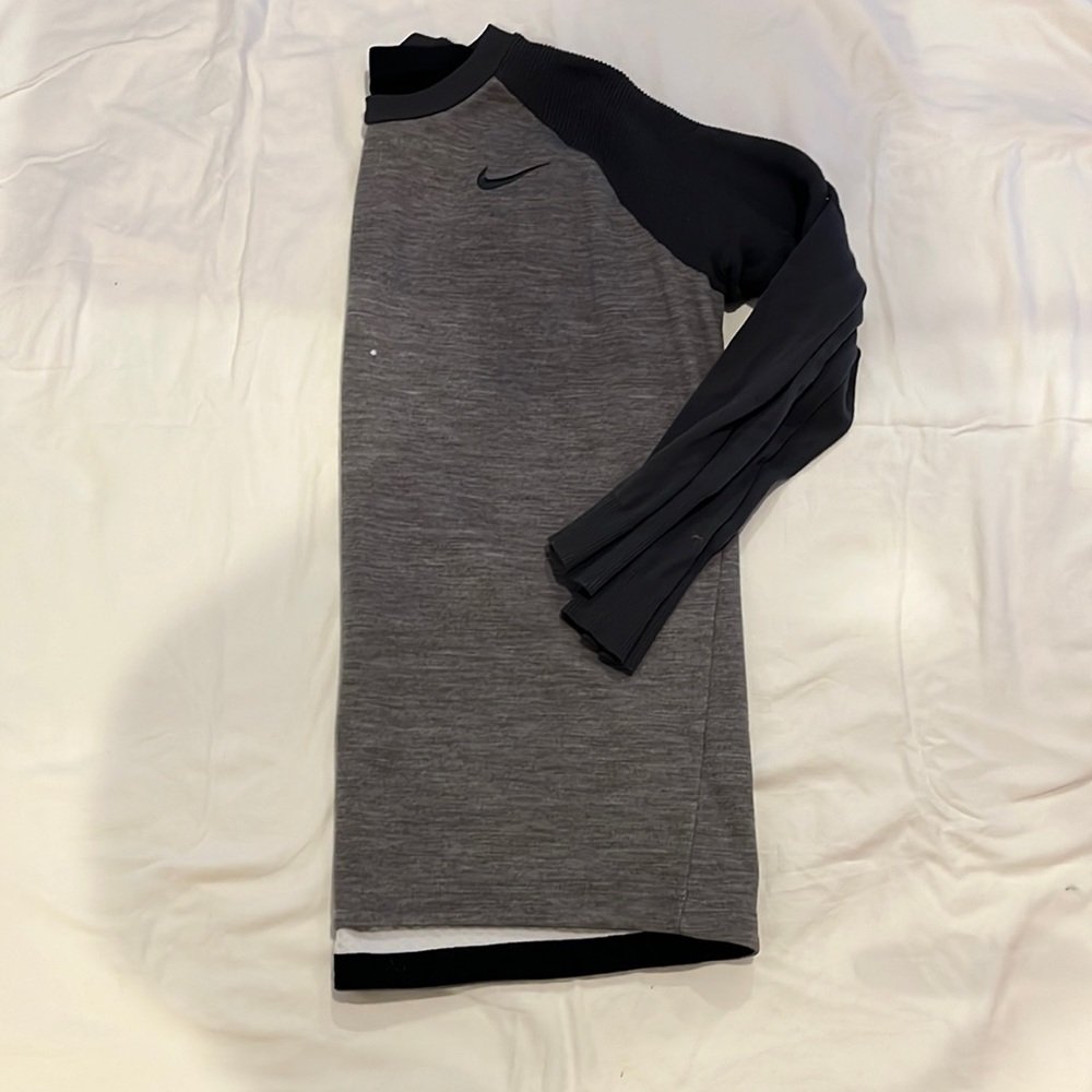Grey Nike golf athletic crew neck.